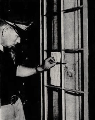 Robison Family Murders Crime Scene Bullet Hole Window July 22 1968.jpg