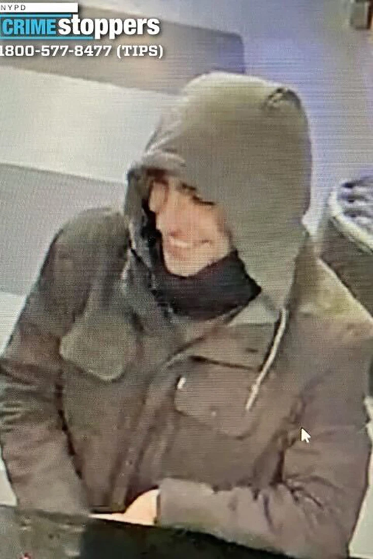 Suspect in Brian Thompson's murder smiling.jpg